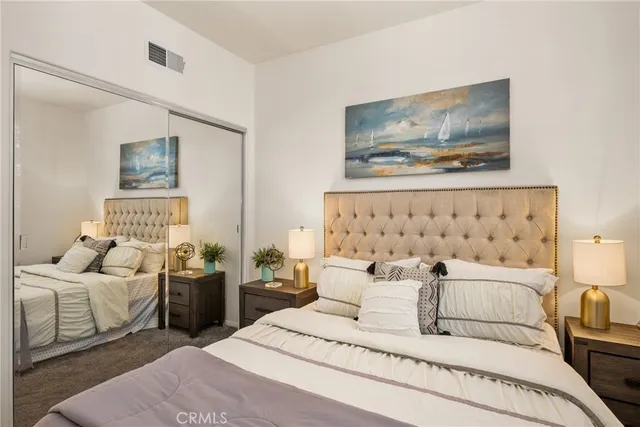 a dining room with furniture and chandelier
