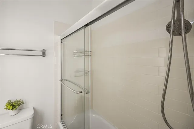 a bathroom with a bathtub and a sink