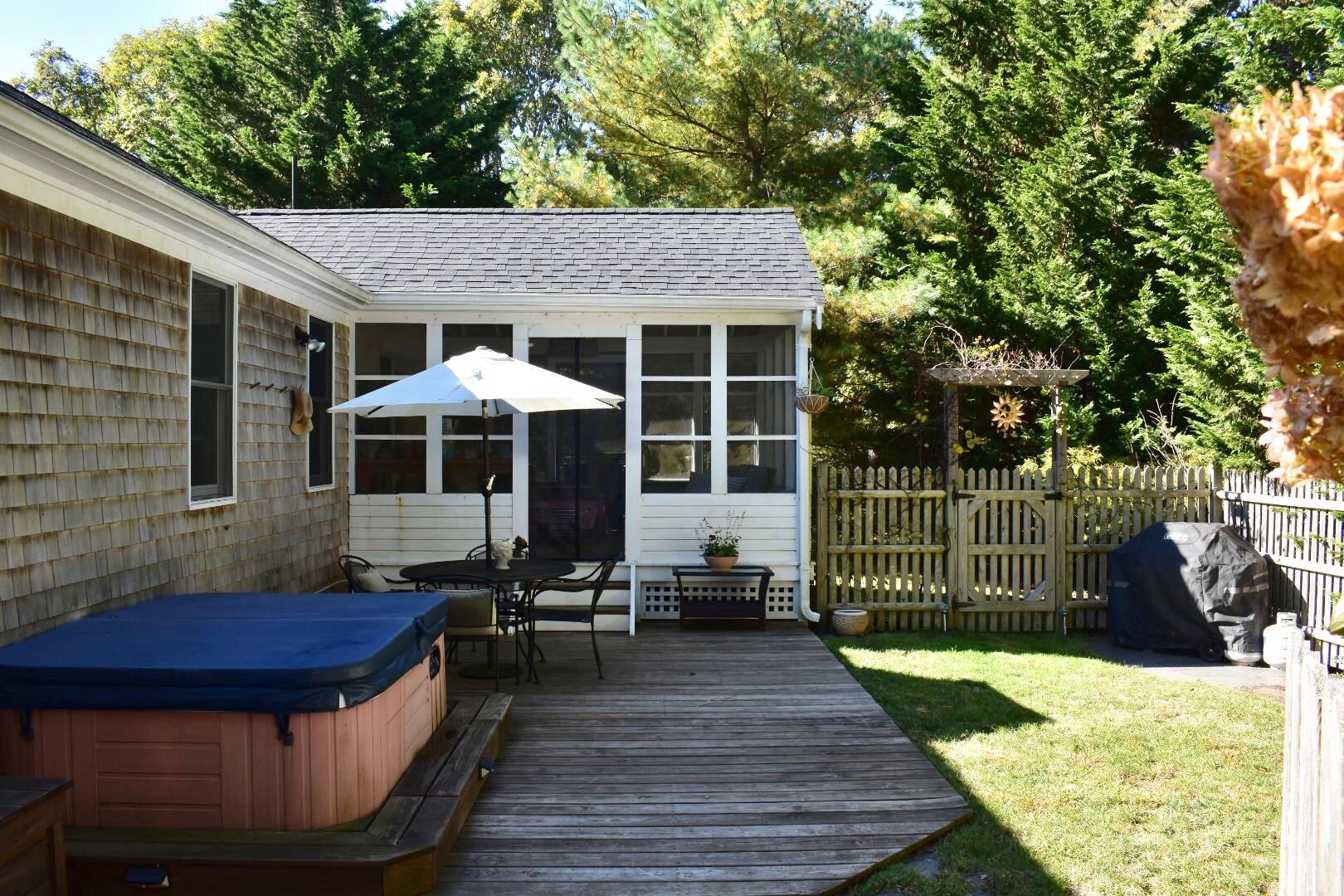 981 Long Pond Road Brewster, MA 02631 - Photo 39 of 41 Deck Area to Screened-In Porch