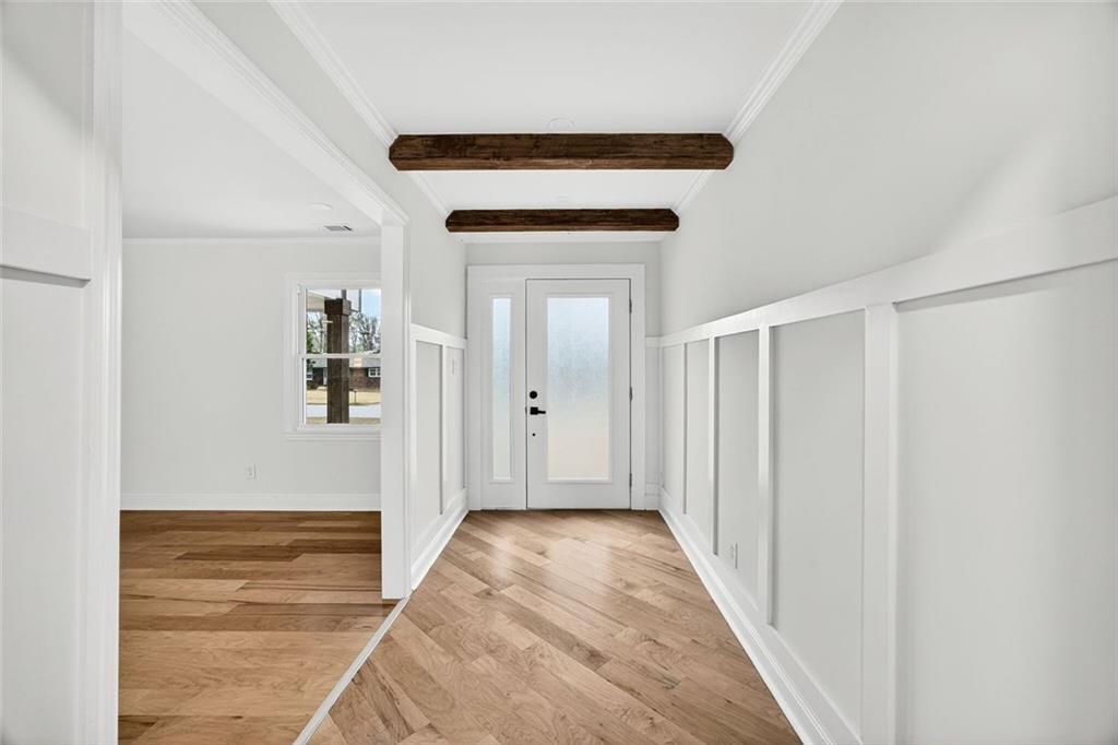 3365 Ardley Road Southwest Atlanta, GA 30311 - Photo 29 of 34 a view of a hallway with wooden floor and entryway