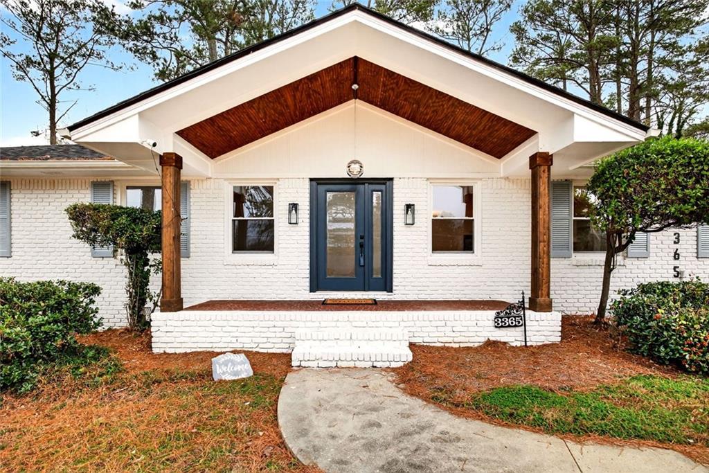3365 Ardley Road Southwest Atlanta, GA 30311 - Photo 3 of 34 a front view of a house with yard