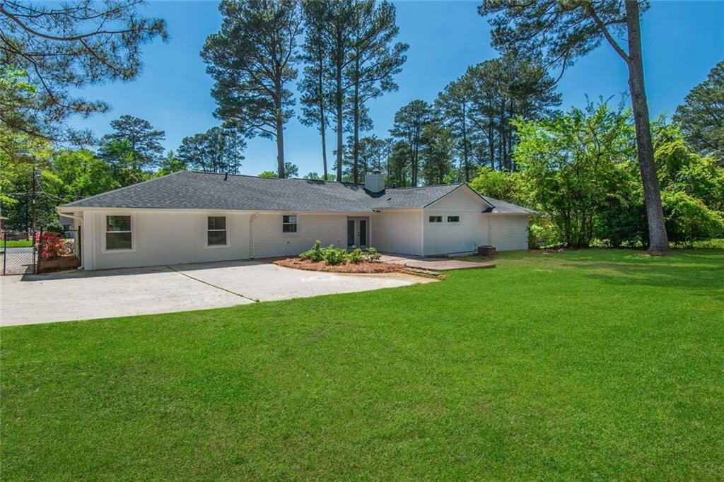 3365 Ardley Road Southwest Atlanta, GA 30311 - Photo 32 of 34 a front view of a house with garden