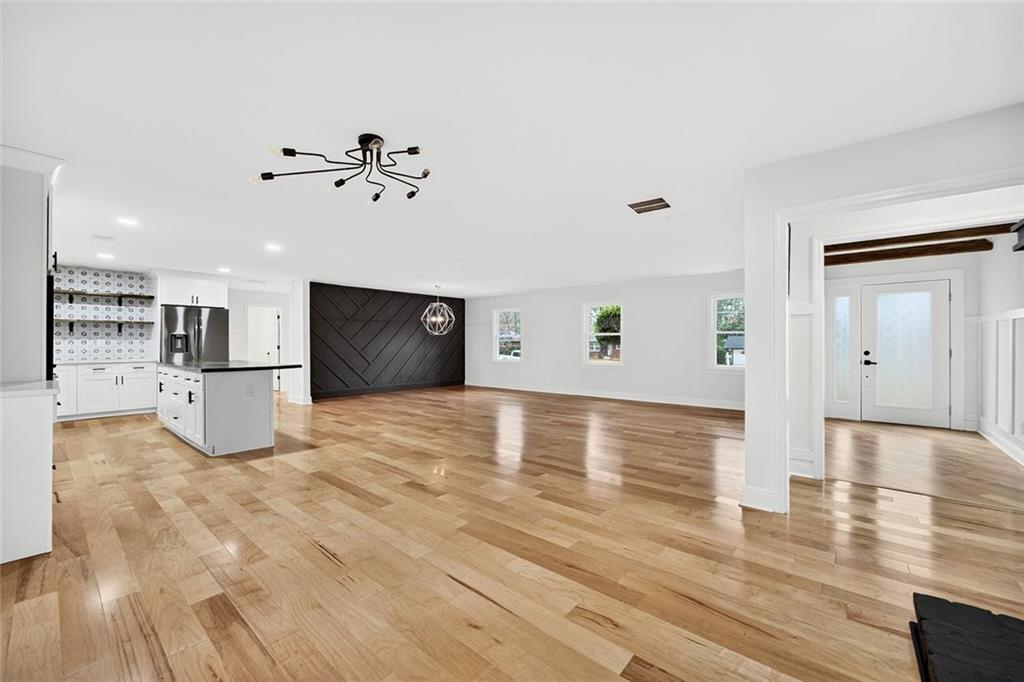 3365 Ardley Road Southwest Atlanta, GA 30311 - Photo 4 of 34 a view of a kitchen with a sink and a stove top oven