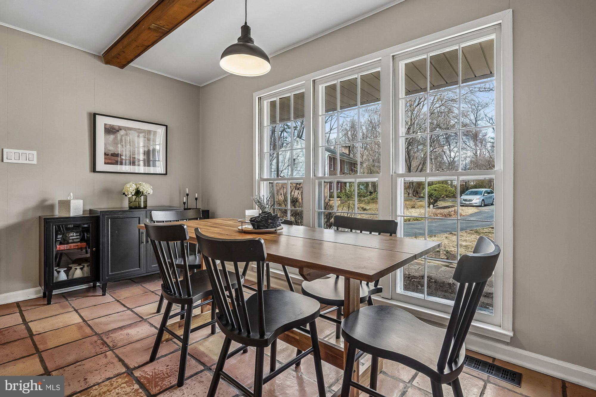 2502 Woodcutter Court Reston, VA 20191 - Photo 18 of 73 a view of a dining room with furniture window and wooden floor
