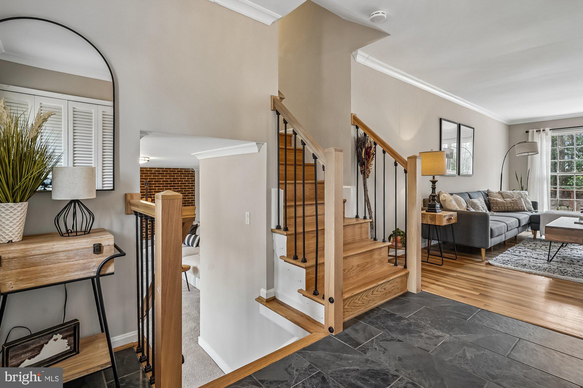 2502 Woodcutter Court Reston, VA 20191 - Photo 3 of 73 a view of a livingroom with furniture and a livingroom