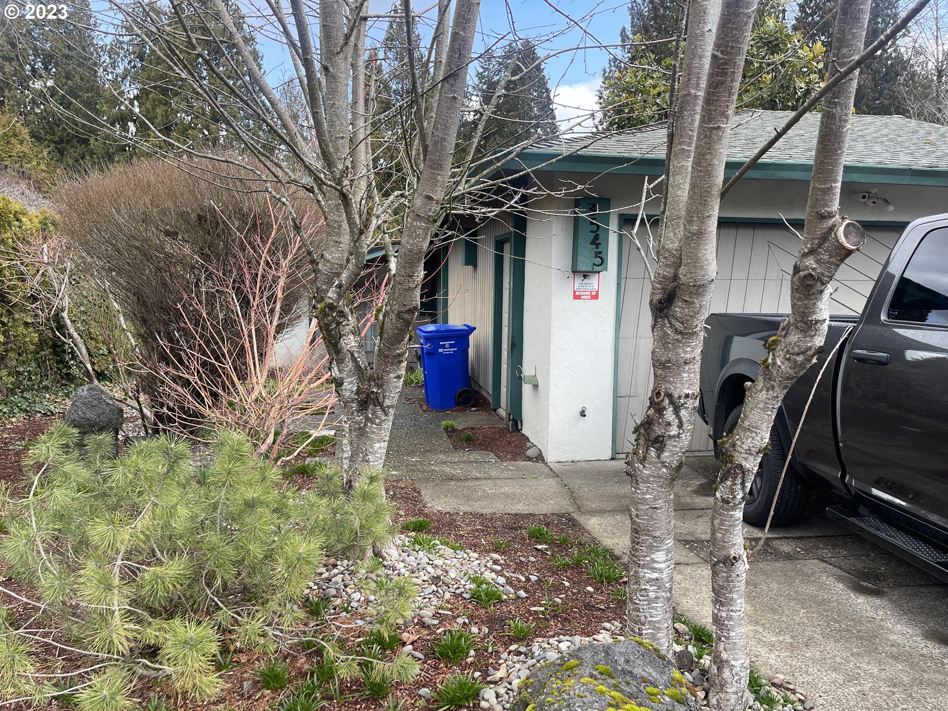 3545 Southeast 1st Street Gresham, OR 97080 - Photo 3 of 5 a view of a house with a yard