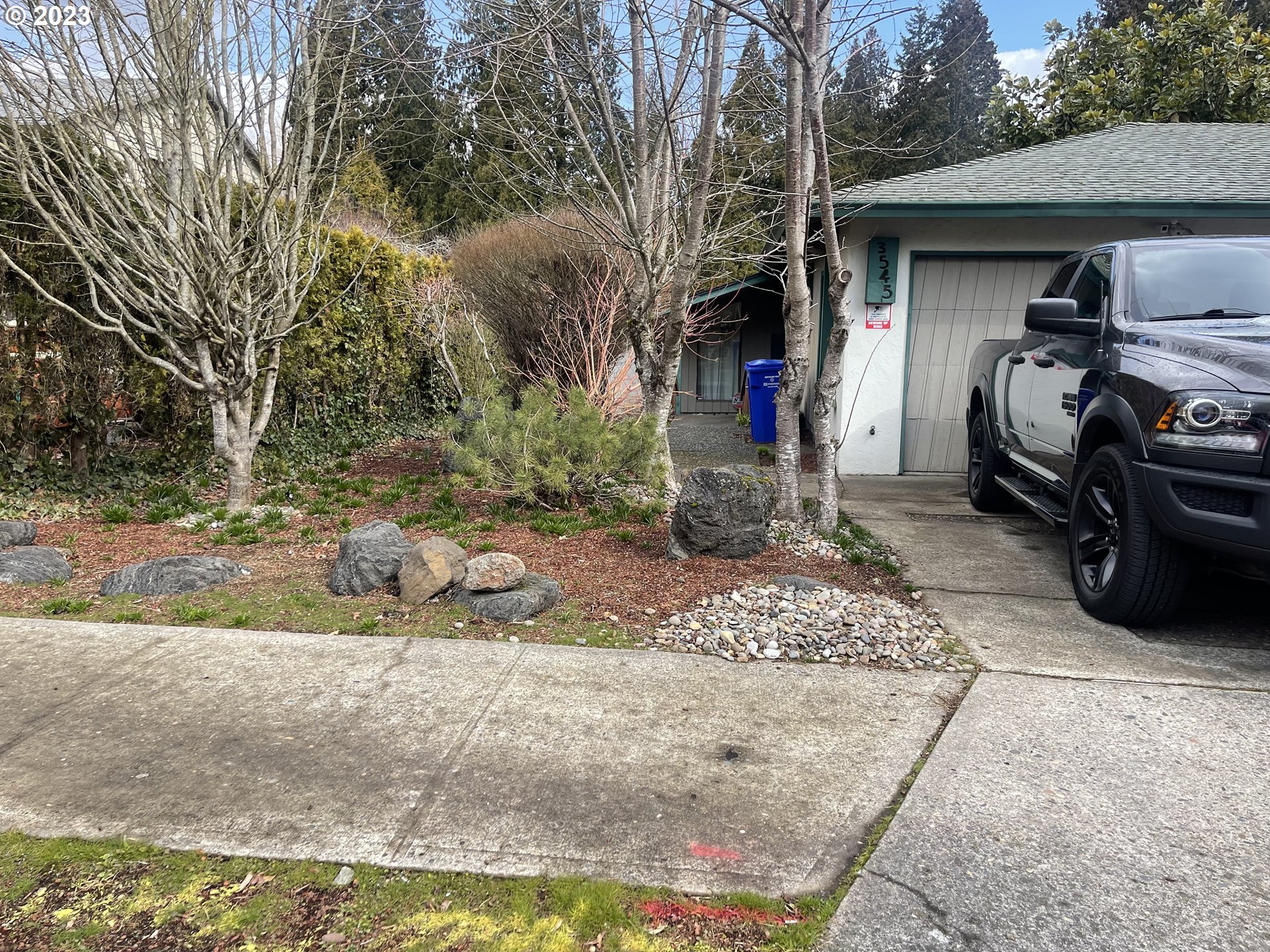 3545 Southeast 1st Street Gresham, OR 97080 - Photo 4 of 5 a view of garage with a car parked in it