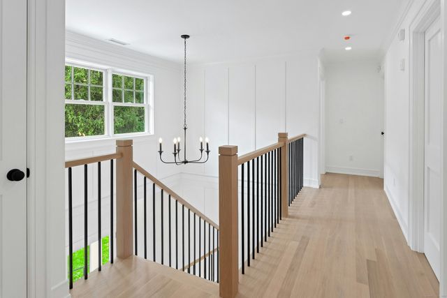 a view of a hallway with windows