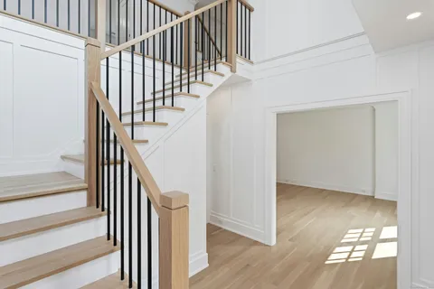 a view of entryway with wooden floor