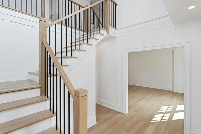 a view of entryway with wooden floor