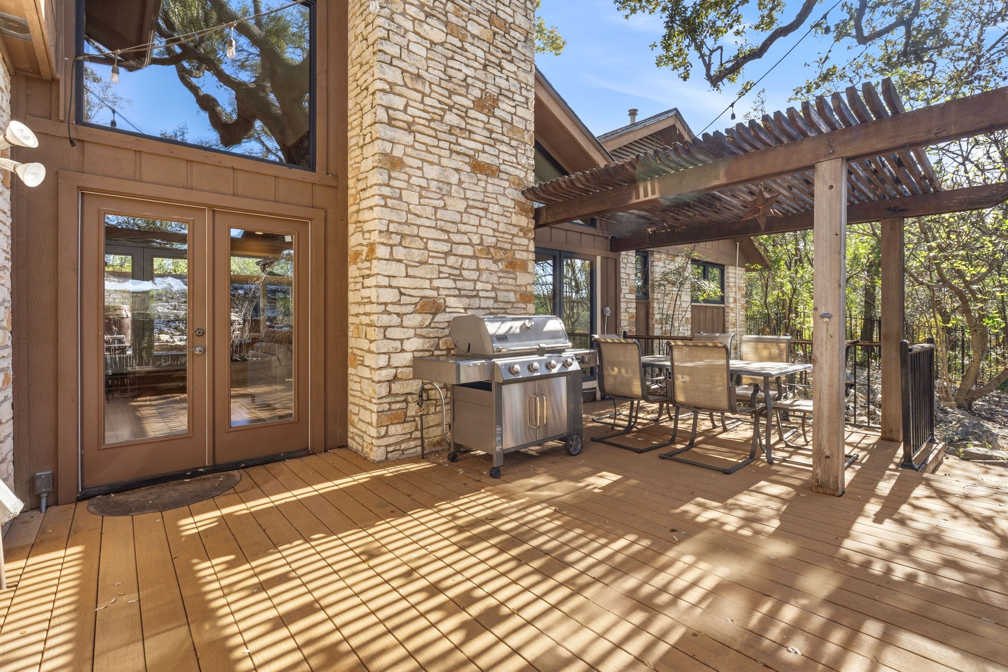 4601 Creek Ridge Austin, TX 78735 - Photo 26 of 40 Deck with french doors, outdoor dining space, and grilling area