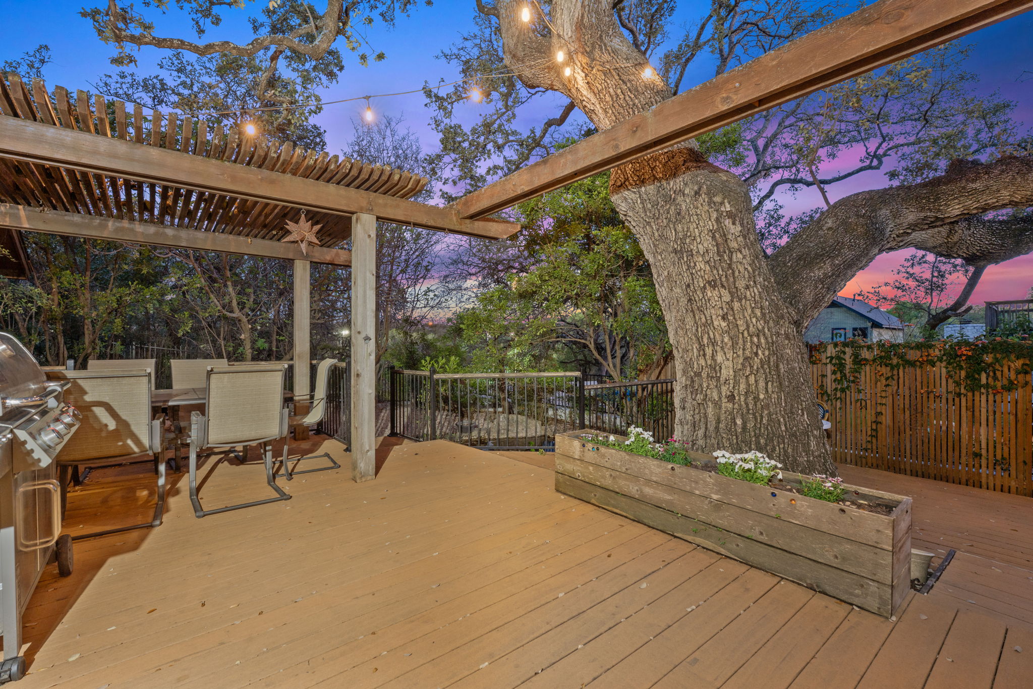 4601 Creek Ridge Austin, TX 78735 - Photo 30 of 40 Deck at dusk featuring a grill