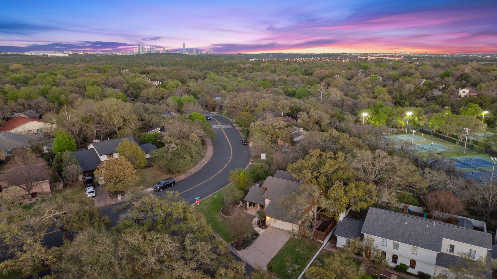 4601 Creek Ridge Austin, TX 78735 - Photo 40 of 40 Aerial view at dusk of a residential view