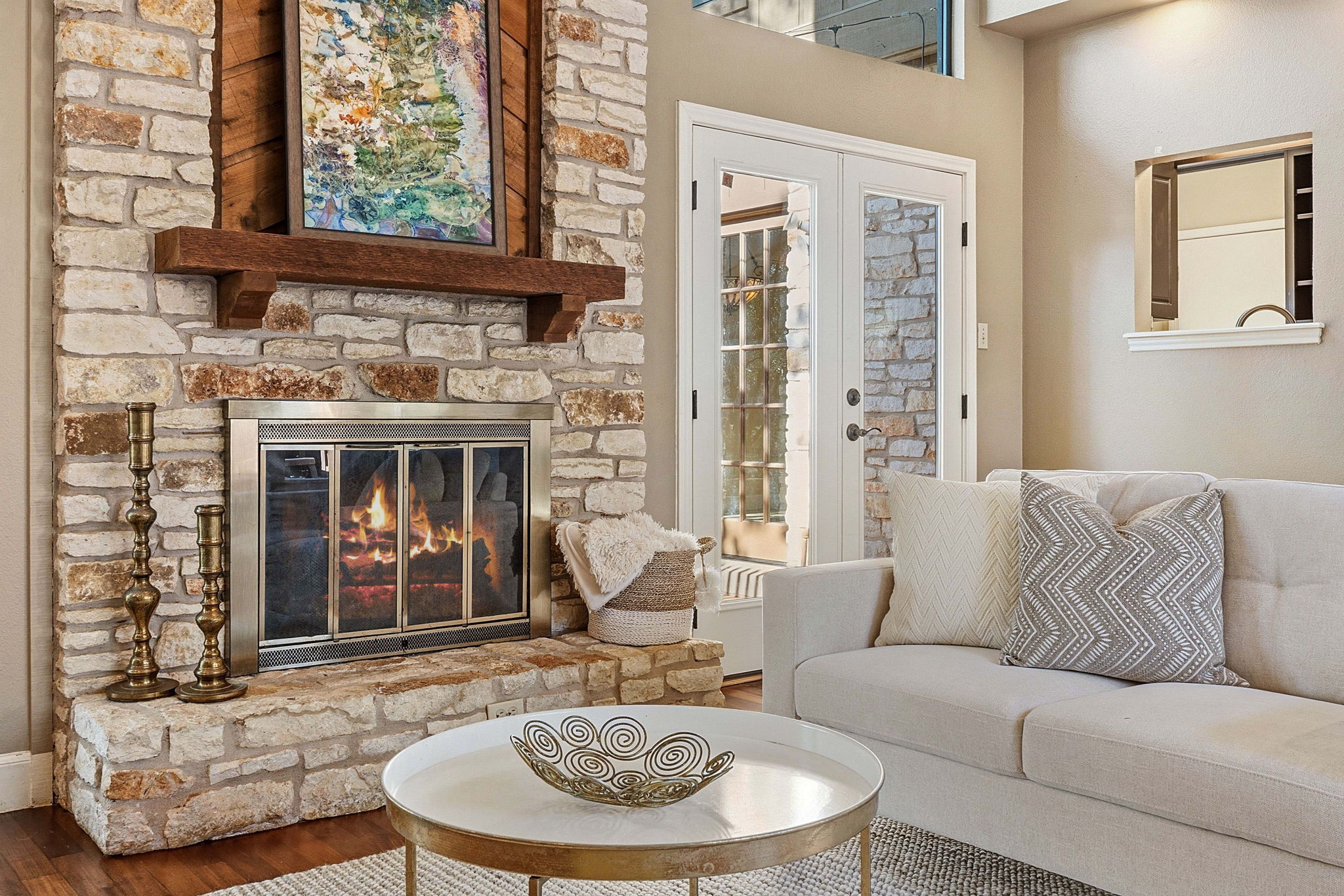 4601 Creek Ridge Austin, TX 78735 - Photo 8 of 40 Living area featuring a fireplace, wood finished floors, and french doors