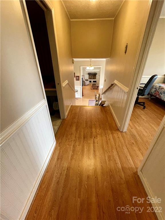 911 Long Branch Road Grover, NC 28073 - Photo 12 of 37 a view of a hallway with wooden floor