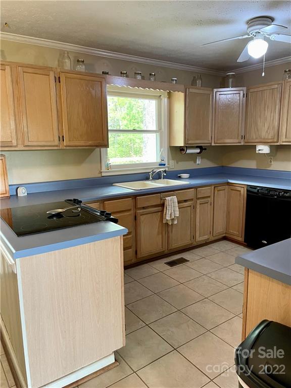 911 Long Branch Road Grover, NC 28073 - Photo 20 of 37 a kitchen with stainless steel appliances granite countertop a sink and a stove