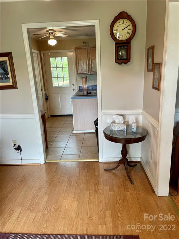 911 Long Branch Road Grover, NC 28073 - Photo 21 of 37 a view of a room with wooden floor and a wooden bench