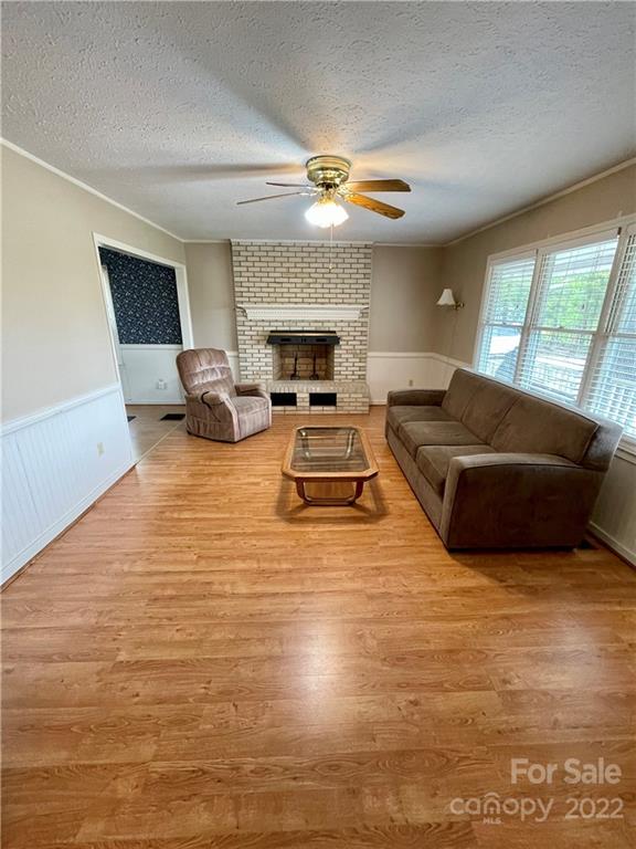 911 Long Branch Road Grover, NC 28073 - Photo 23 of 37 a living room with furniture and a fireplace