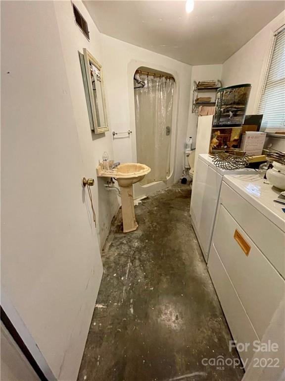 911 Long Branch Road Grover, NC 28073 - Photo 30 of 37 a bathroom with a sink toilet and mirror