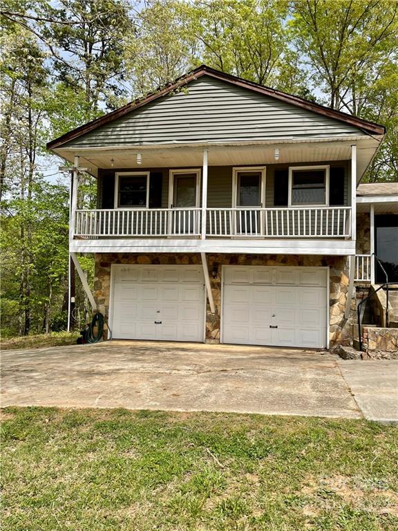 911 Long Branch Road Grover, NC 28073 - Photo 35 of 37 a house with trees in the background