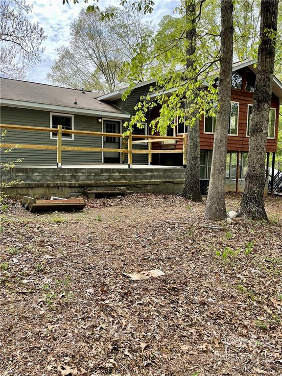 911 Long Branch Road Grover, NC 28073 - Photo 6 of 37 a front view of a house with a garden