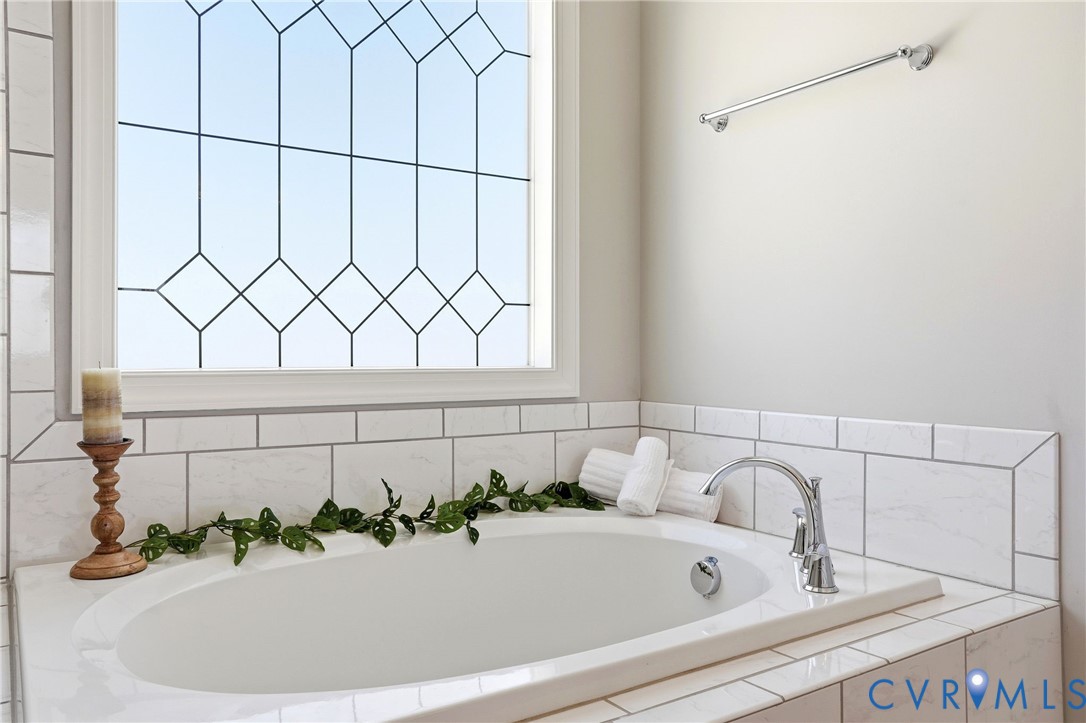 12050 Cameron Creek Road Glen Allen, VA 23059 - Photo 20 of 36 a bathroom with a sink and mirror