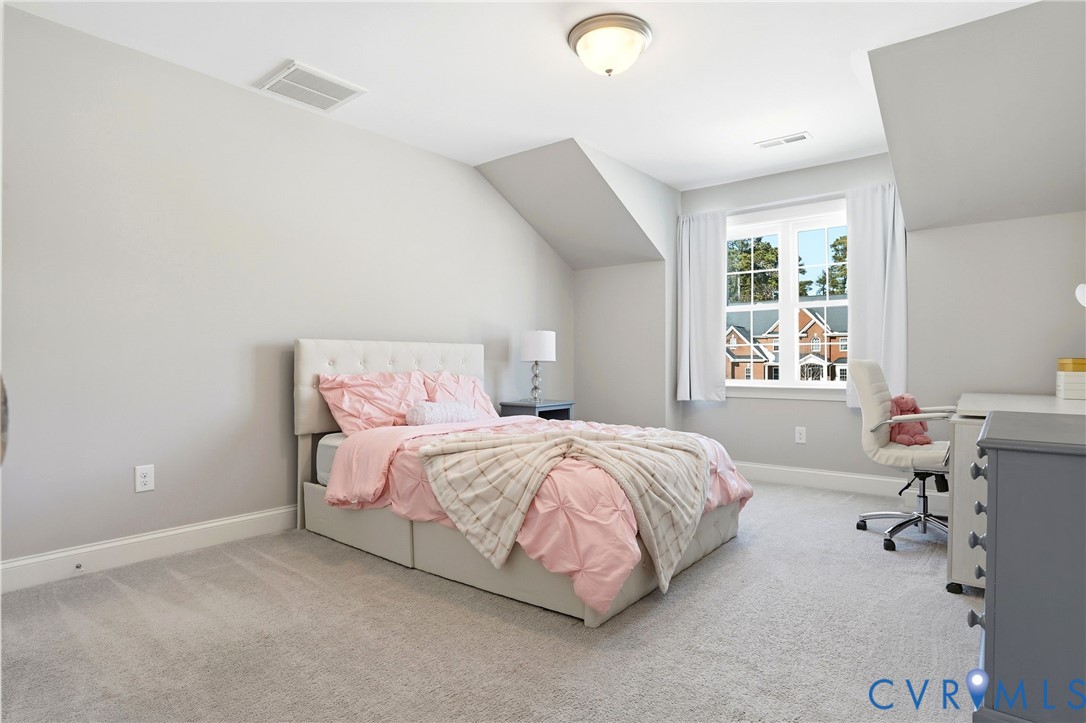12050 Cameron Creek Road Glen Allen, VA 23059 - Photo 25 of 36 a spacious bedroom with a bed and a window