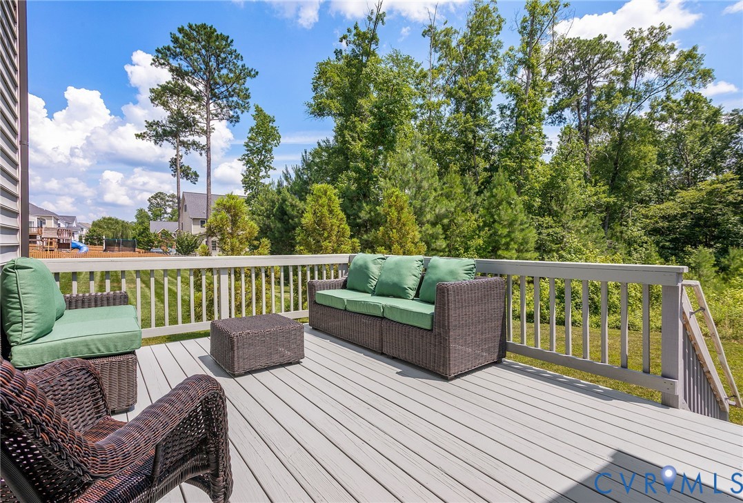 12050 Cameron Creek Road Glen Allen, VA 23059 - Photo 30 of 36 a view of a deck with furniture