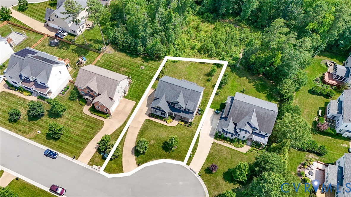 12050 Cameron Creek Road Glen Allen, VA 23059 - Photo 32 of 36 an aerial view of a house with a garden and trees