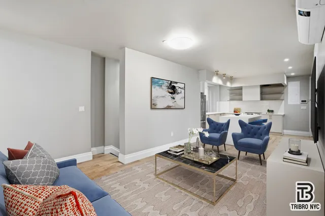 a living room with furniture rug and couch