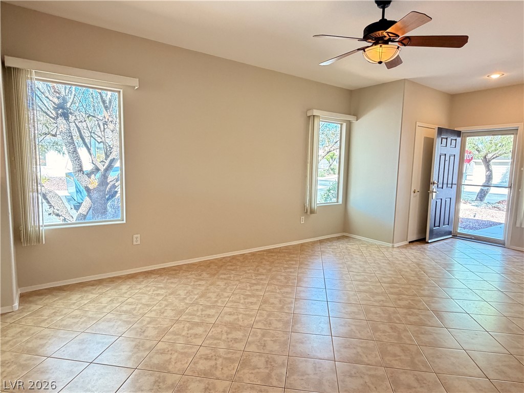 2523 Romanza Road Henderson, NV 89052 - Photo 14 of 24 A welcoming entry offers durable tile flooring and a refreshing ceiling fan.