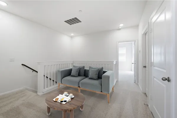 a view of a hallway with entryway