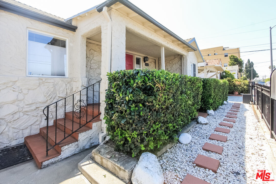 a view of a porch with furniture