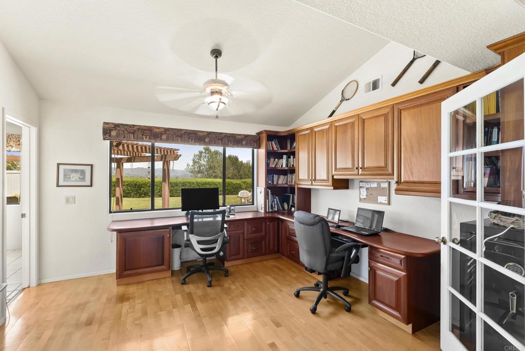 2221 Cortina Circle Escondido, CA 92029 - Photo 13 of 36 a view of a workspace with furniture and a window