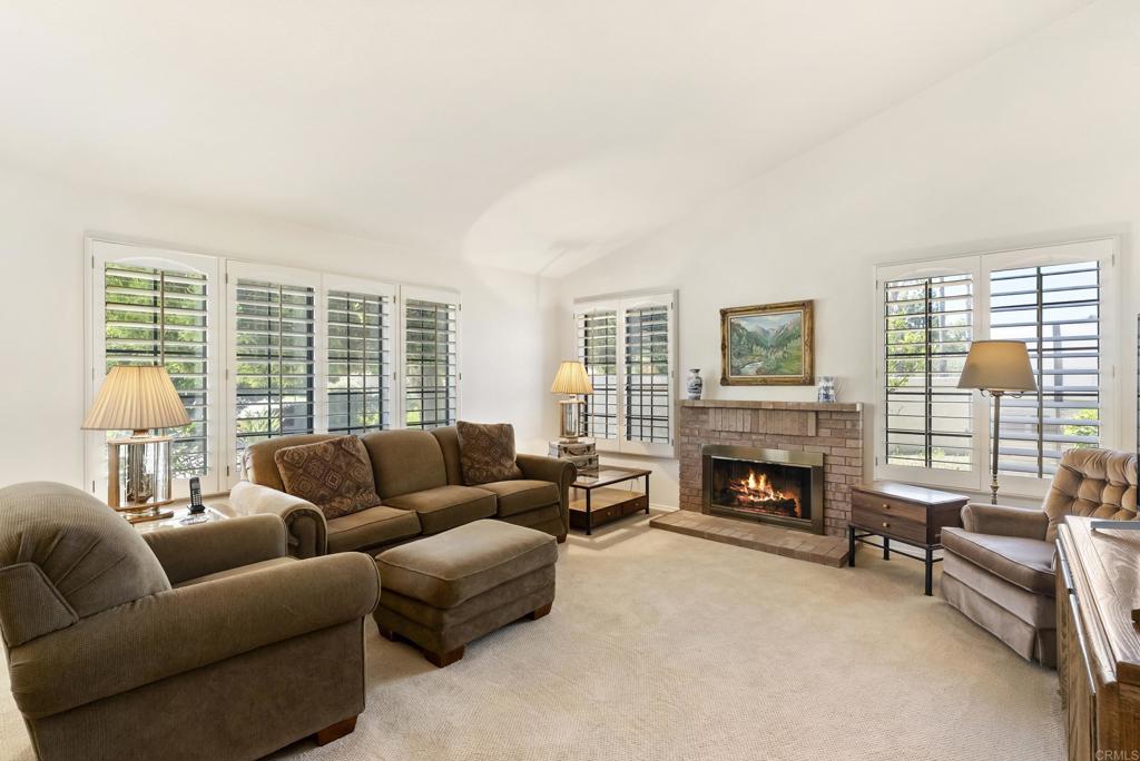 2221 Cortina Circle Escondido, CA 92029 - Photo 4 of 36 a living room with furniture and a fireplace