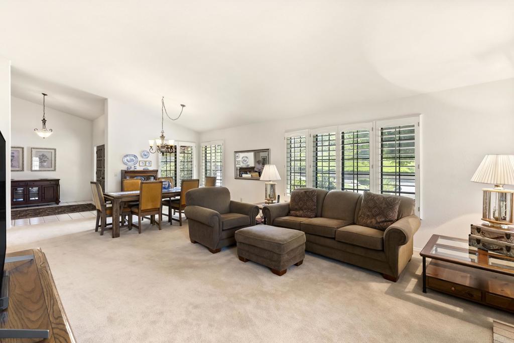 2221 Cortina Circle Escondido, CA 92029 - Photo 6 of 36 a living room with furniture and a large window