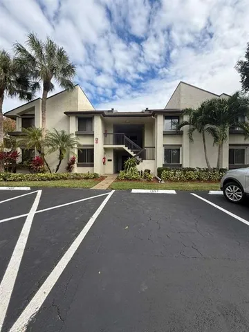 a front view of a house with a patio