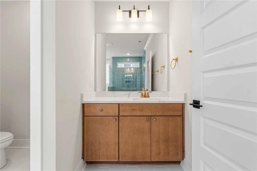 319 Summerall Drive Anderson, SC 29621 - Photo 21 of 37 This sleek bathroom features a single vanity, offering both style and everyday functionality.