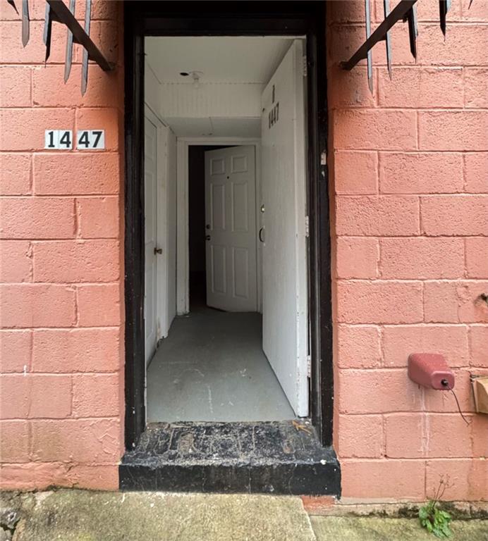 a view of a door with a rug