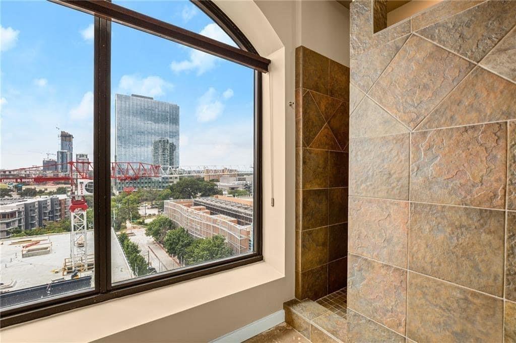 507 Sabine Street, Unit 705 Austin, TX 78701 - Photo 11 of 32 a view of a glass door with a floor to ceiling window