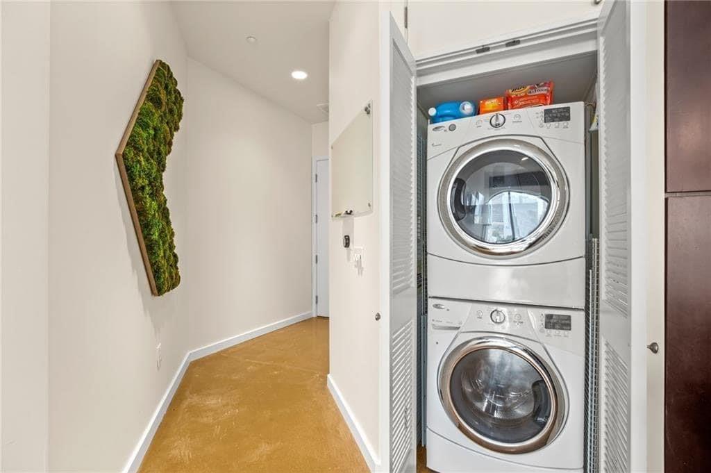 507 Sabine Street, Unit 705 Austin, TX 78701 - Photo 26 of 32 a utility room with dryer and washer