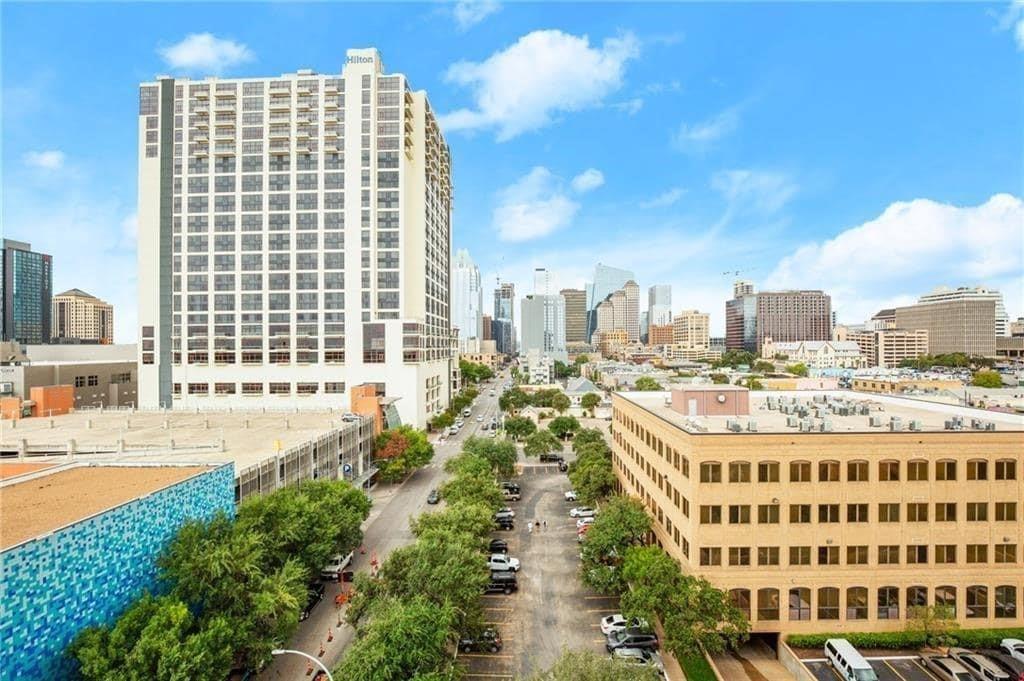 507 Sabine Street, Unit 705 Austin, TX 78701 - Photo 27 of 32 a view of a city that has tall buildings