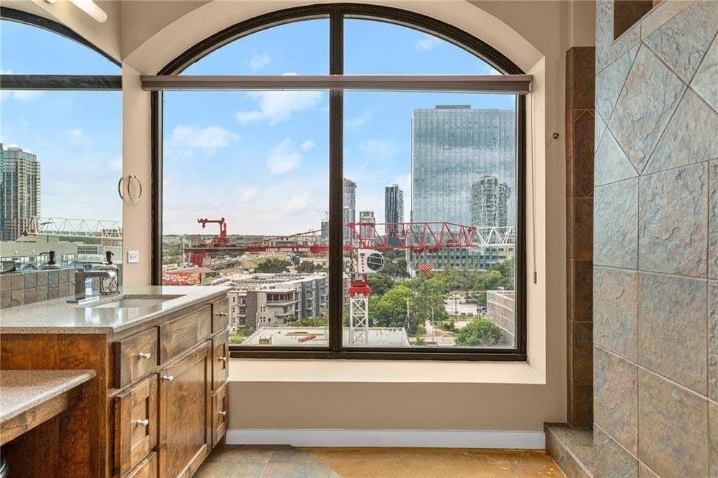 507 Sabine Street, Unit 705 Austin, TX 78701 - Photo 10 of 32 a view of a kitchen with a large window