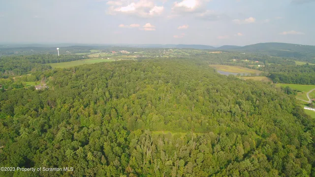 a view of an ocean and a mountain