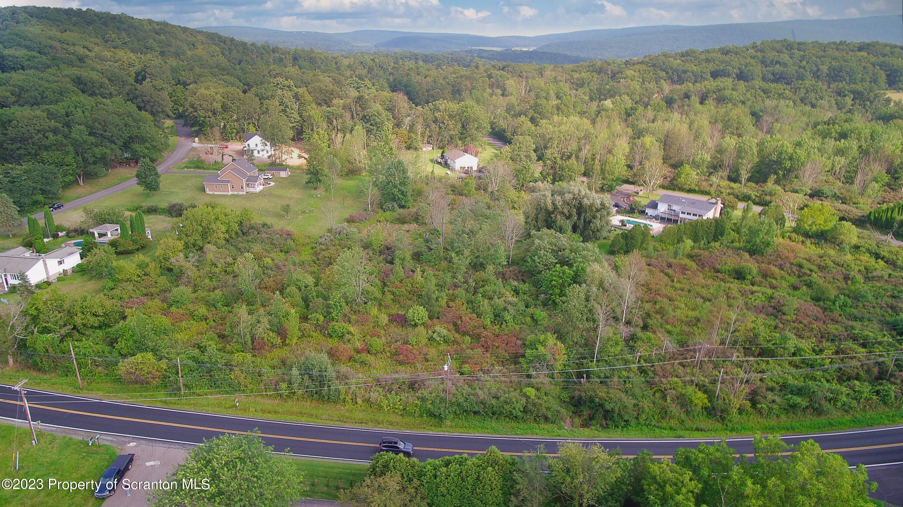 Newton Ransom Boulevard Clarks Summit, PA 18411 - Photo 4 of 12 a view of a yard with an outdoor seating