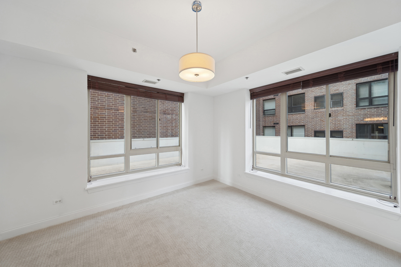 230 West Division Street, Unit 501 Chicago, IL 60610 - Photo 17 of 27 a view of an empty room with a window