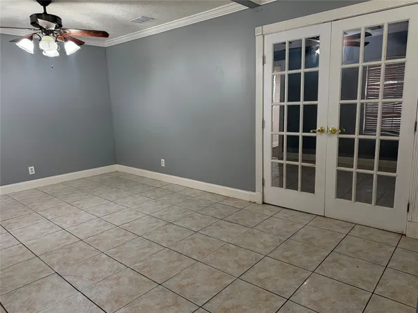 a view of empty room with windows