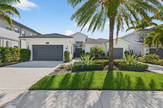 a living room with furniture a large window and flat screen tv