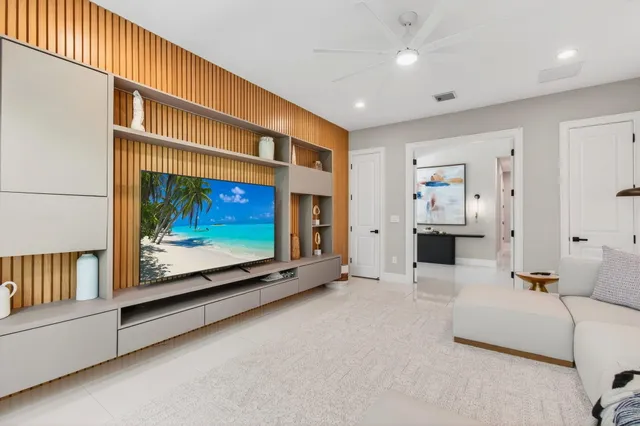 a spacious bedroom with a bed and window