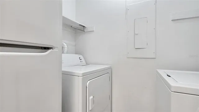 a bathroom with a shower and a sink